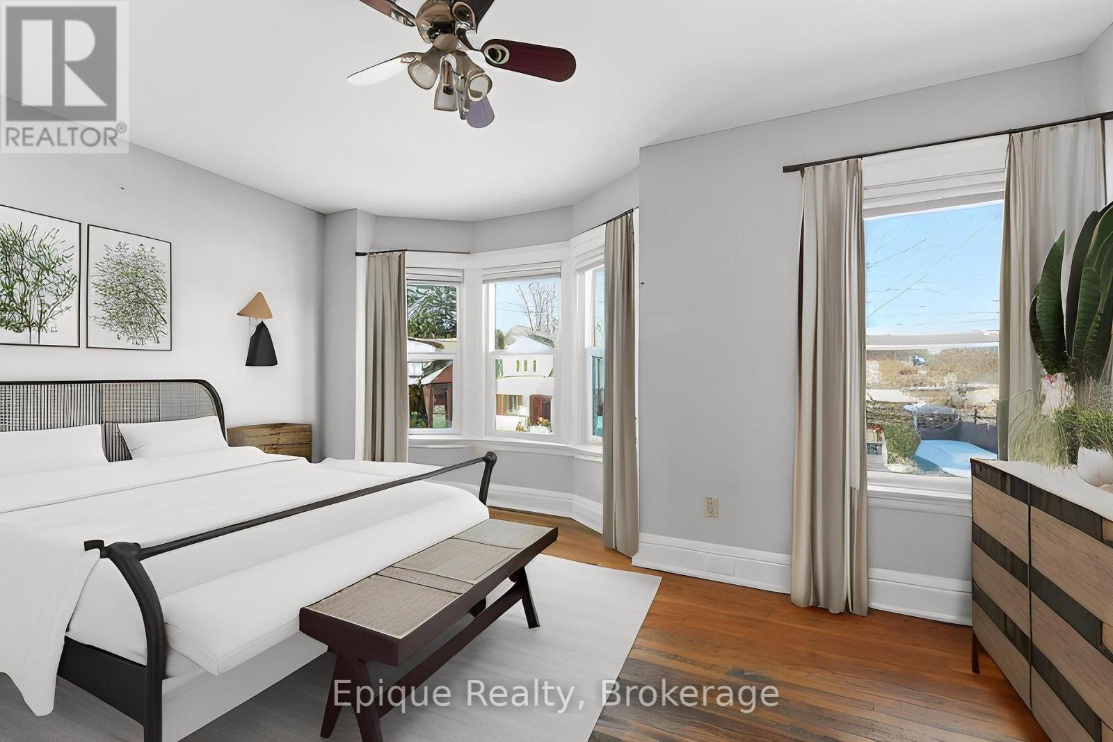 Virtually staged primary bedroom - 67 Kensington Avenue S, Hamilton, ON - Indoor