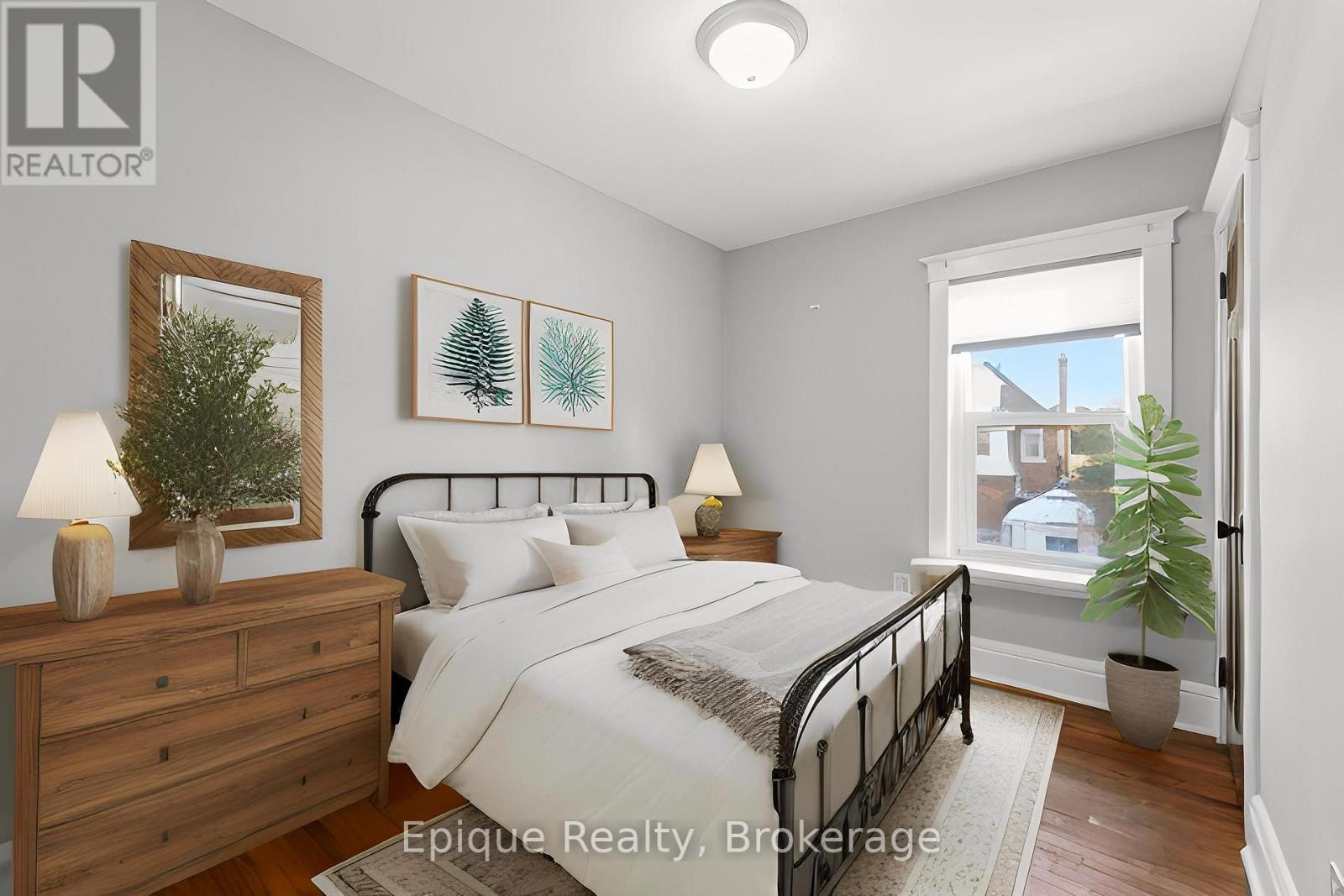 Virtually staged beddroom - 67 Kensington Avenue S, Hamilton, ON - Indoor Photo Showing Bedroom