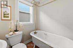 Main bathroom virtually staged -