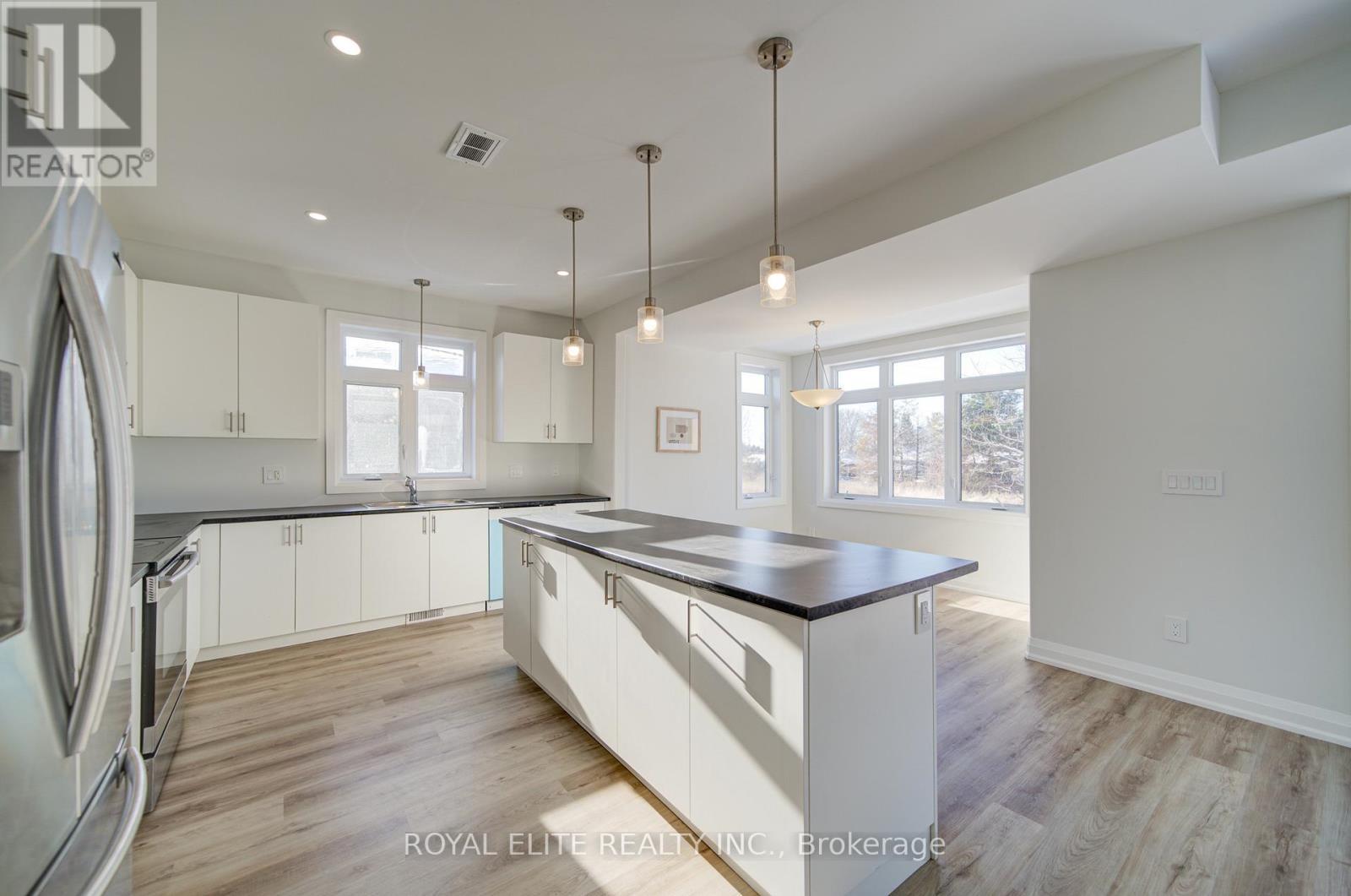 13 Lillys Court, Cramahe, ON - Indoor Photo Showing Kitchen With Double Sink With Upgraded Kitchen