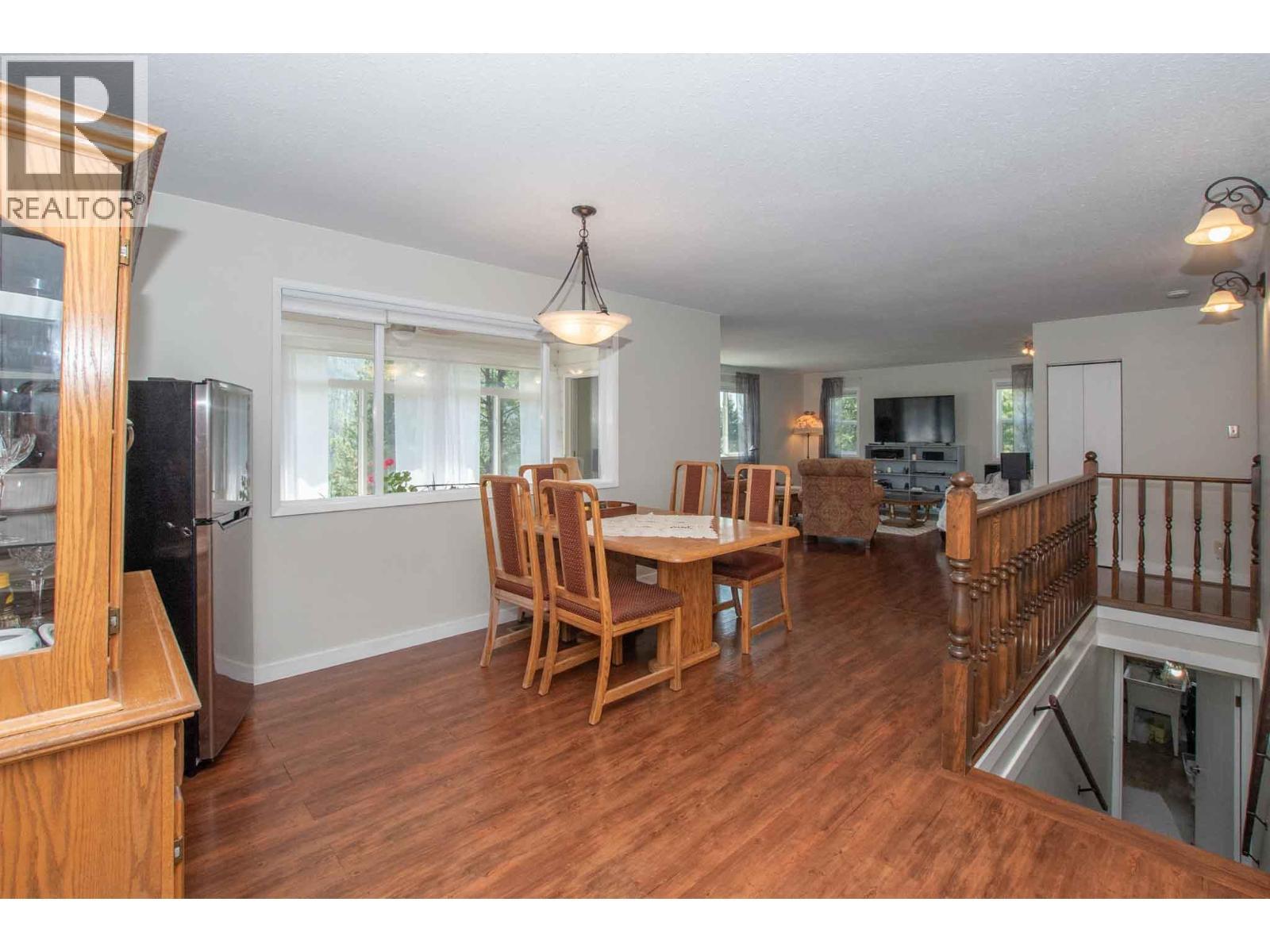 Open spacious dining and living room - 3022 Loon Lake Road, Loon Lake, BC - Indoor Photo Showing Dining Room