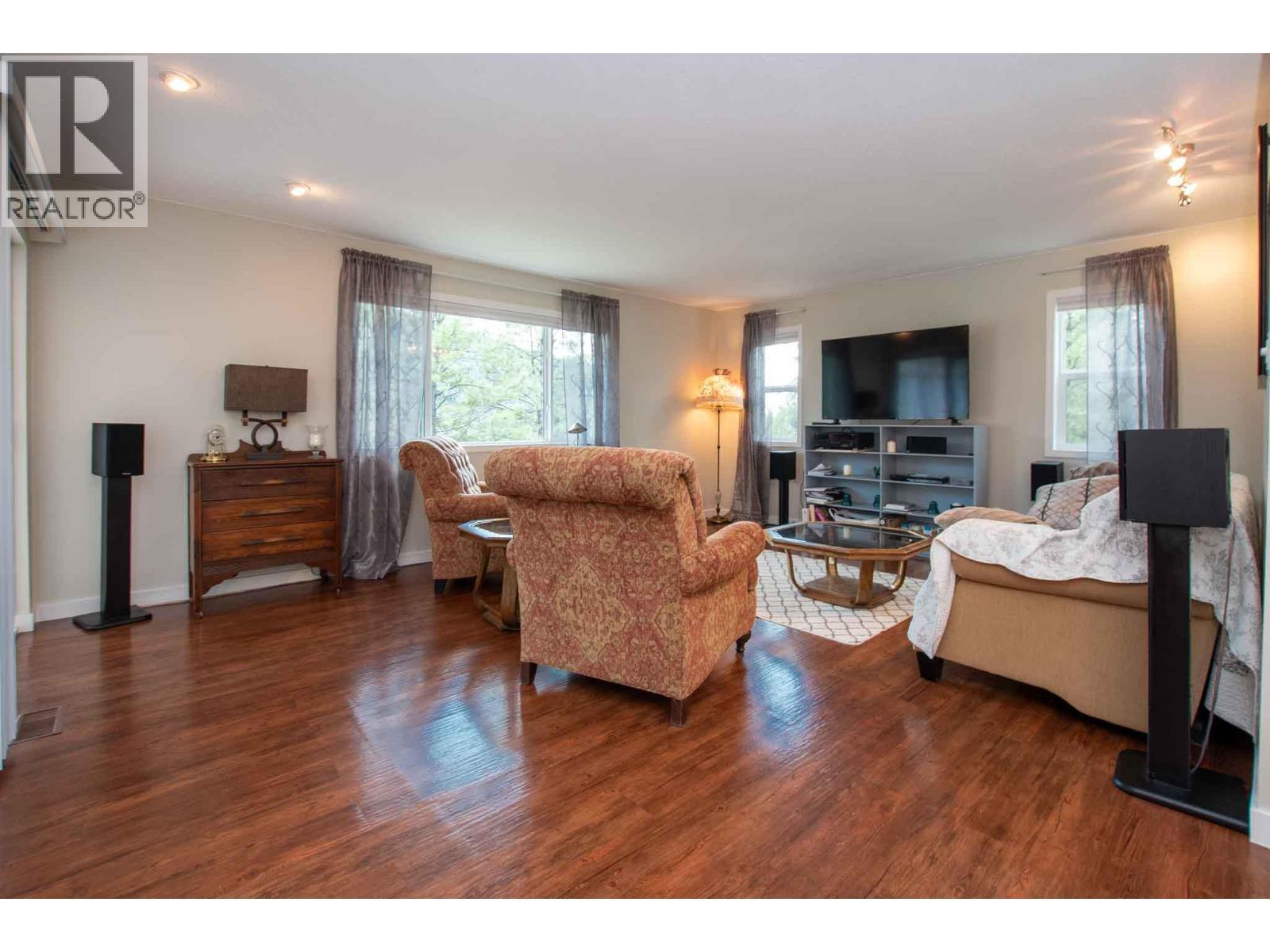 Living room with Lake Views - 3022 Loon Lake Road, Loon Lake, BC - Indoor Photo Showing Living Room