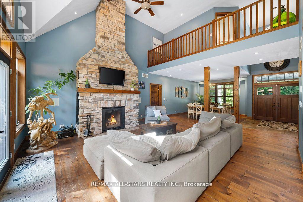 8 Harmonious Drive, Kawartha Lakes (Somerville), ON - Indoor Photo Showing Living Room With Fireplace