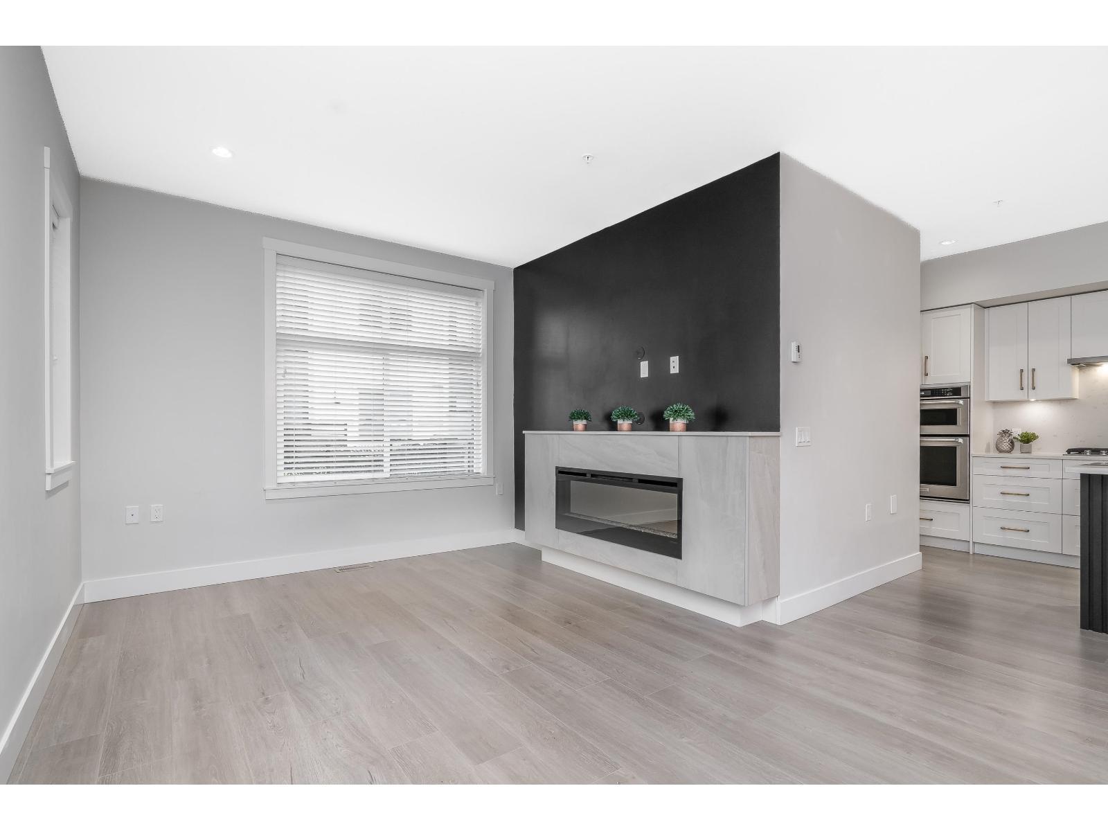 14 22128 48A Avenue, Langley, BC - Indoor Photo Showing Other Room With Fireplace