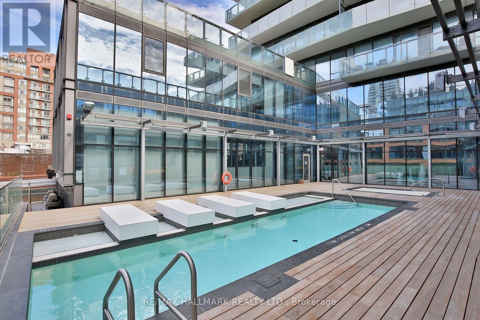 Outdoor pool - 2408 - 390 Cherry Street, Toronto, ON - Photo Showing Other Room With In Ground Pool