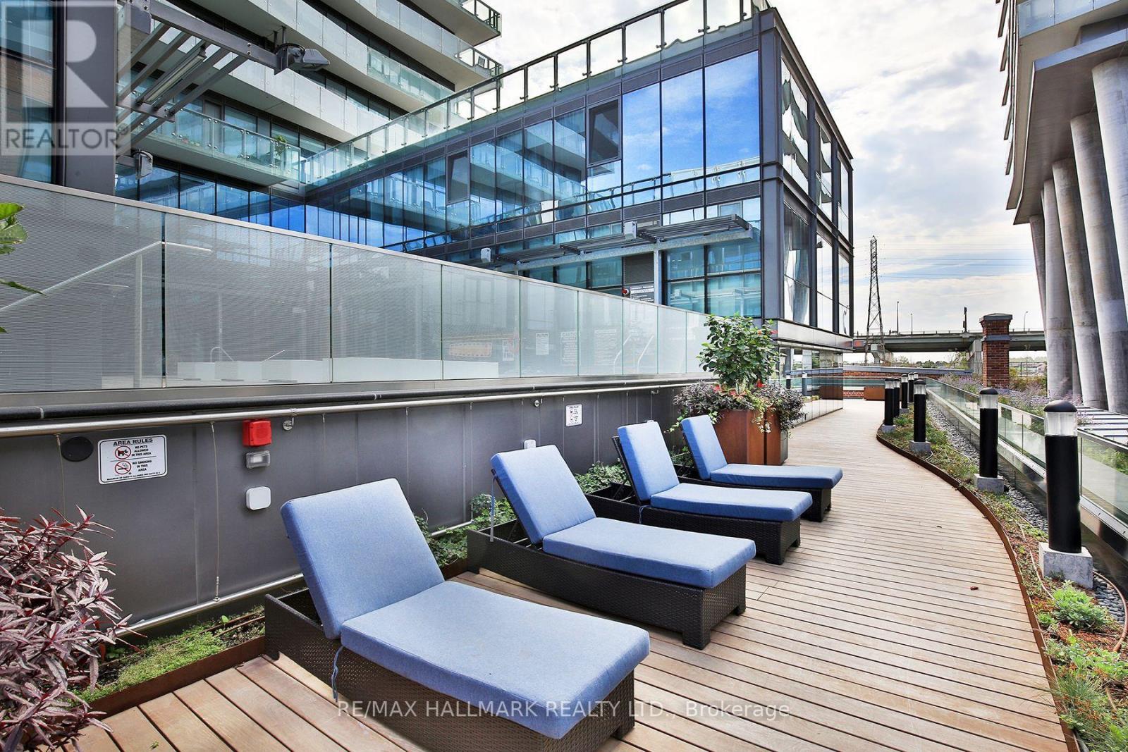Pool deck lounging area - 2408 - 390 Cherry Street, Toronto, ON - Outdoor With Deck Patio Veranda