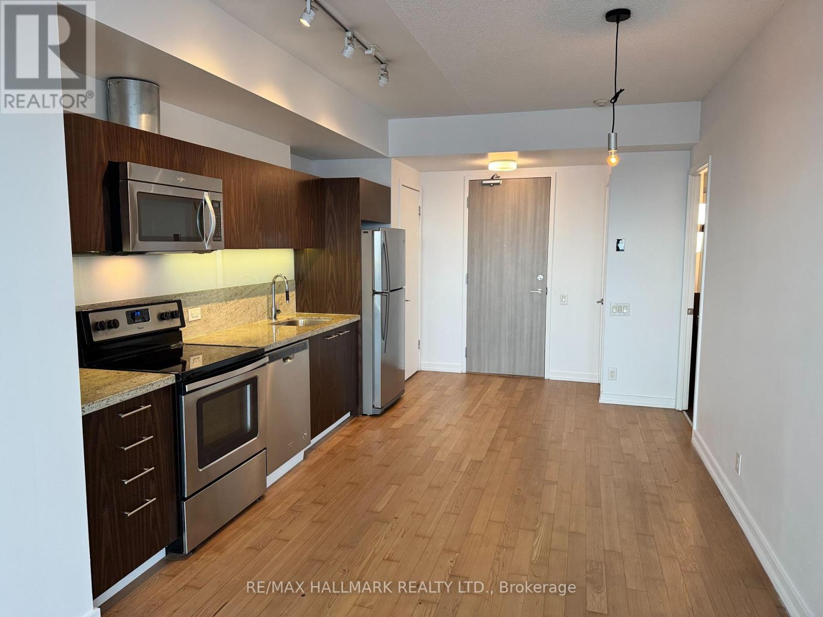 Kitchen showing foyer, laundry - 2408 - 390 Cherry Street, Toronto, ON - Indoor Photo Showing Kitchen With Stainless Steel Kitchen