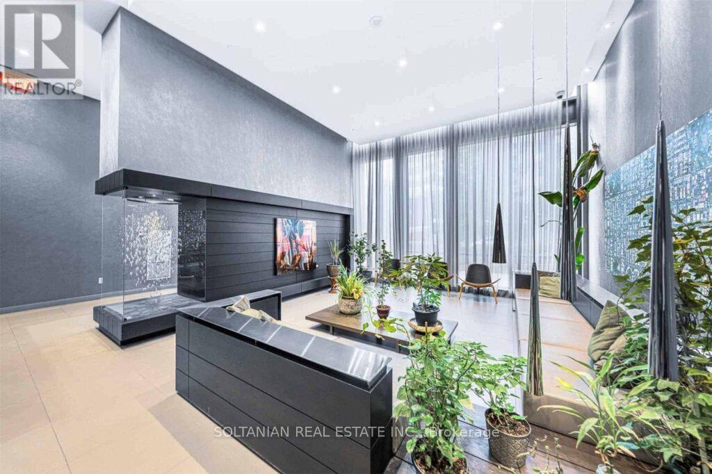 323 - 55 Regent Park Boulevard, Toronto, ON - Indoor With Fireplace