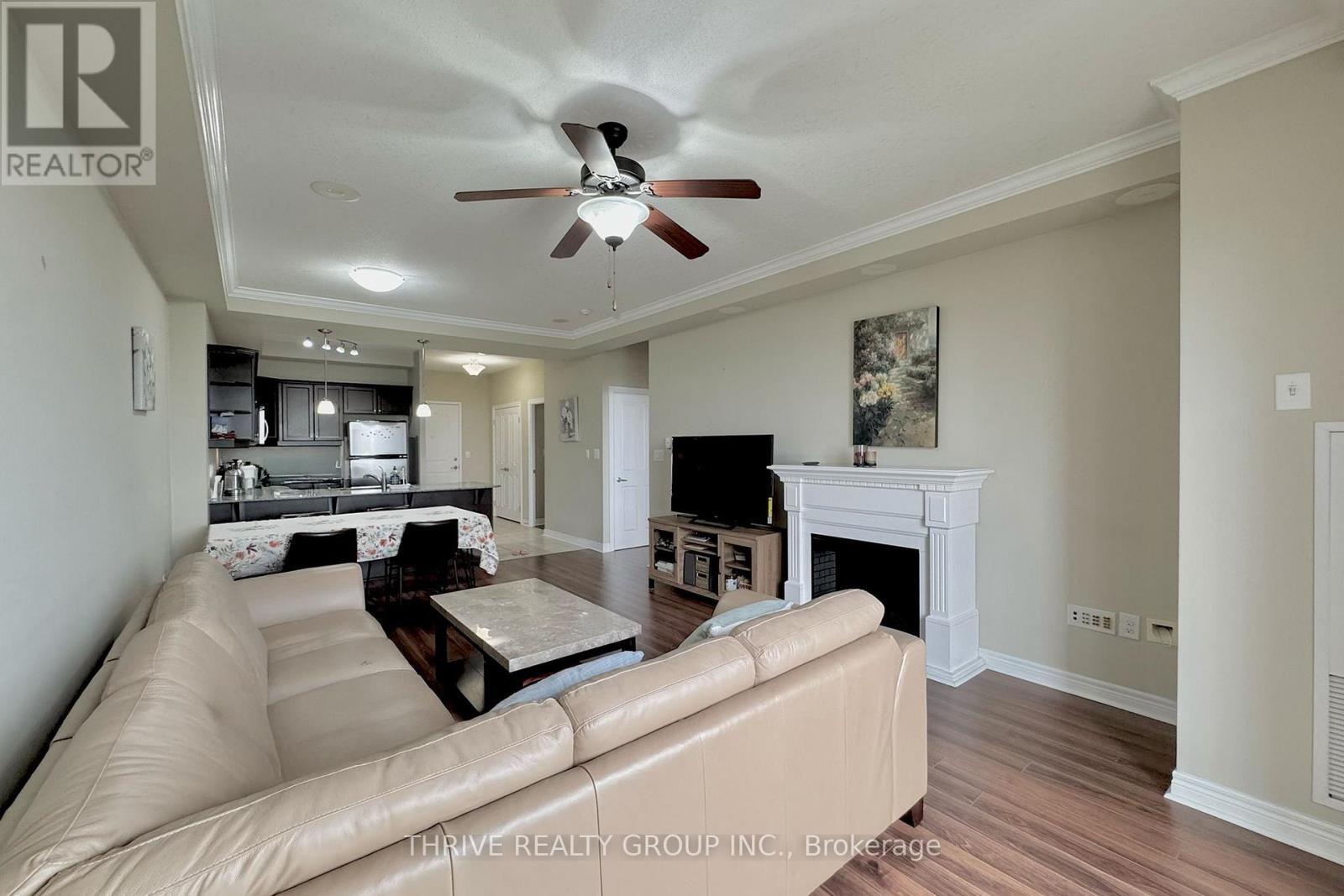 1206 - 1030 Coronation Drive, London North (North I), ON - Indoor Photo Showing Living Room With Fireplace
