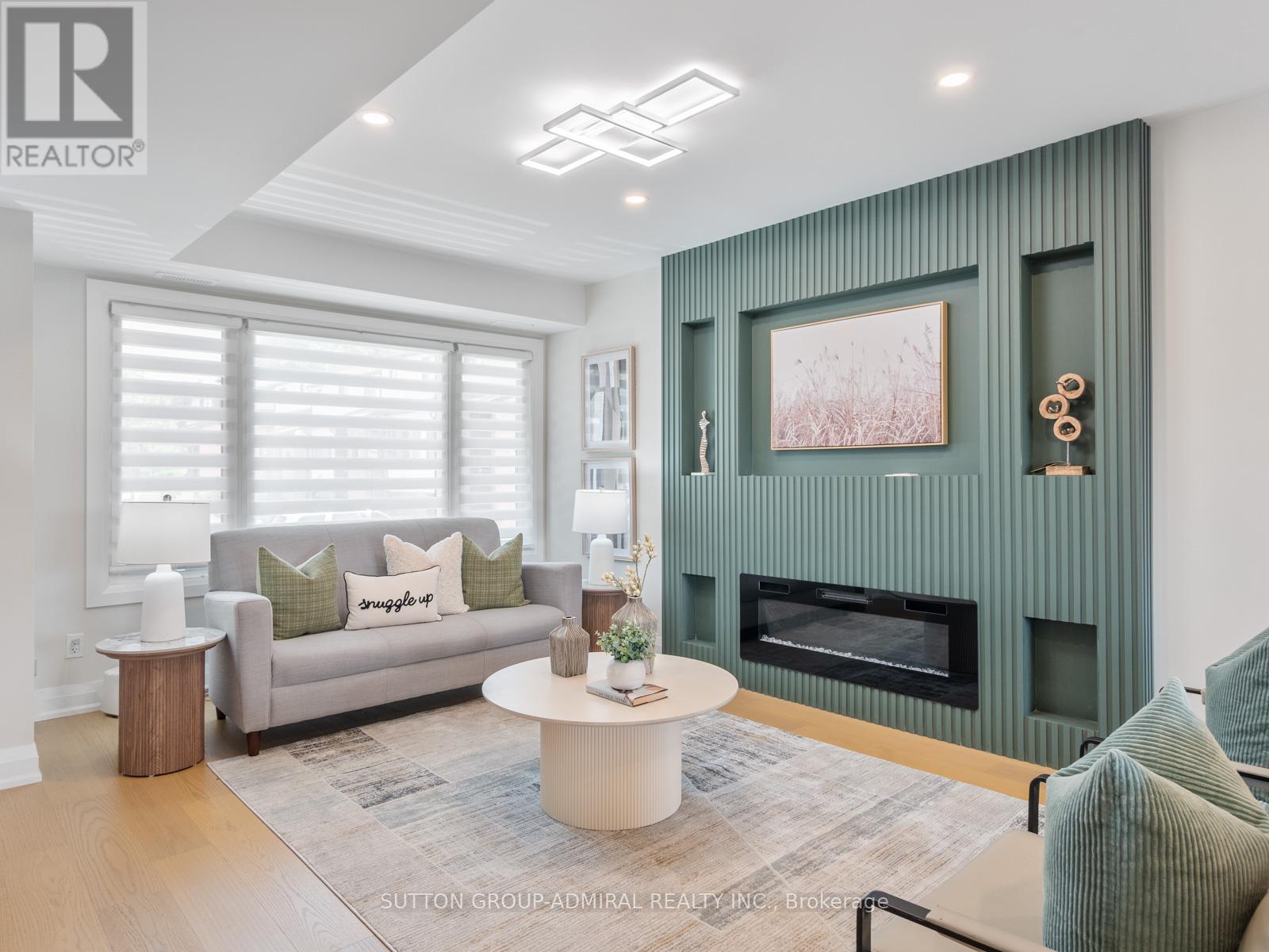 42 - 765 Oklahoma Drive, Pickering, ON - Indoor Photo Showing Living Room With Fireplace