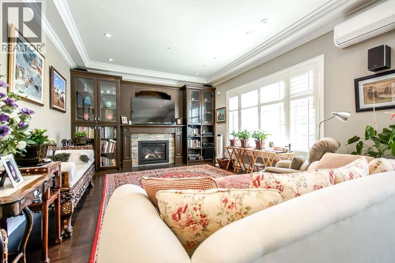 47** Granville Street, Vancouver, BC - Indoor Photo Showing Living Room With Fireplace