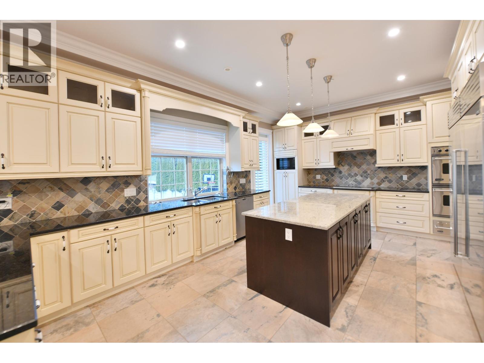 47** Granville Street, Vancouver, BC - Indoor Photo Showing Kitchen With Double Sink With Upgraded Kitchen