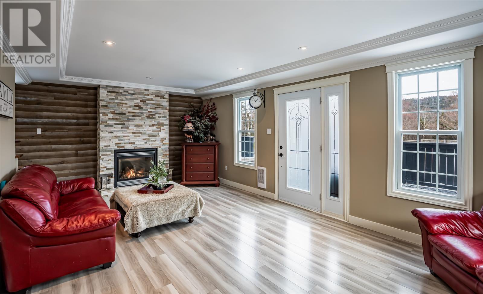 6 Pine Marsh Road, Conception Bay South, NL - Indoor Photo Showing Living Room With Fireplace