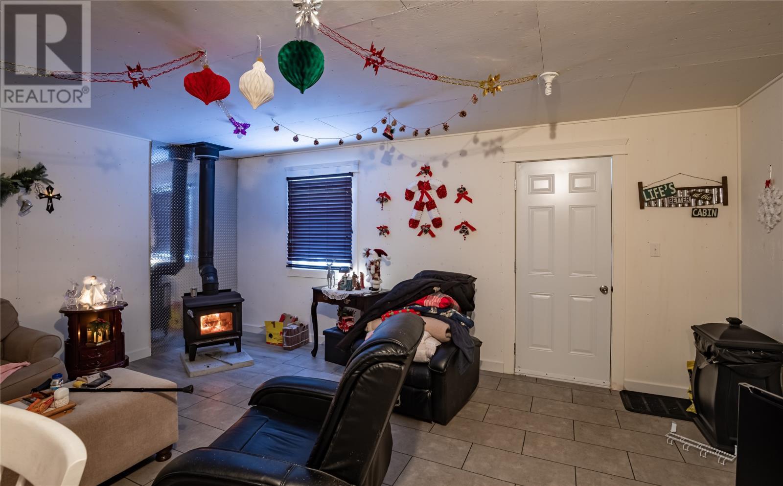 6 Pine Marsh Road, Conception Bay South, NL - Indoor With Fireplace