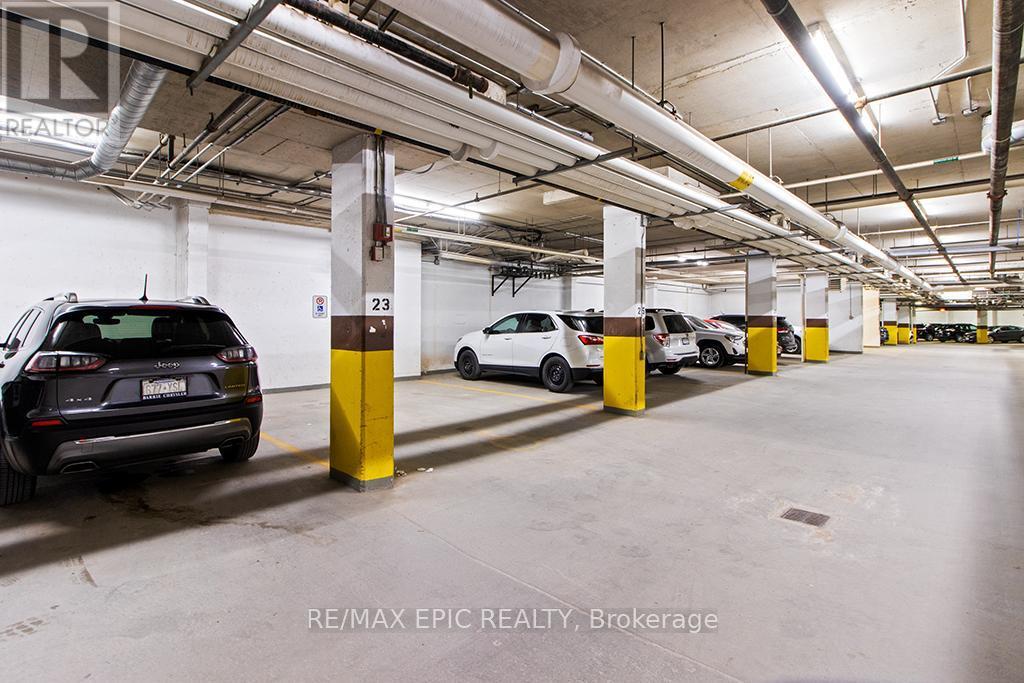 #252 - 220 Gord Canning Drive, Blue Mountains, ON - Indoor Photo Showing Garage