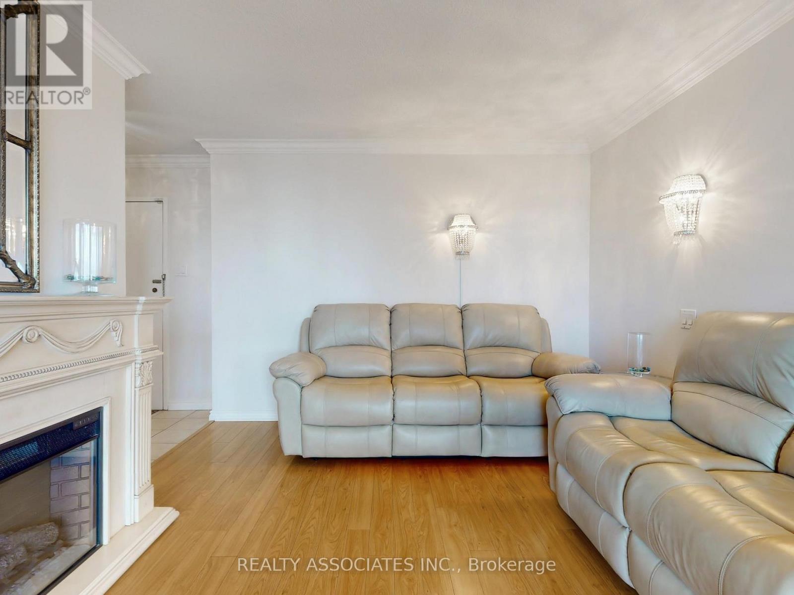 1704 - 205 Hilda Avenue, Toronto, ON - Indoor Photo Showing Living Room With Fireplace