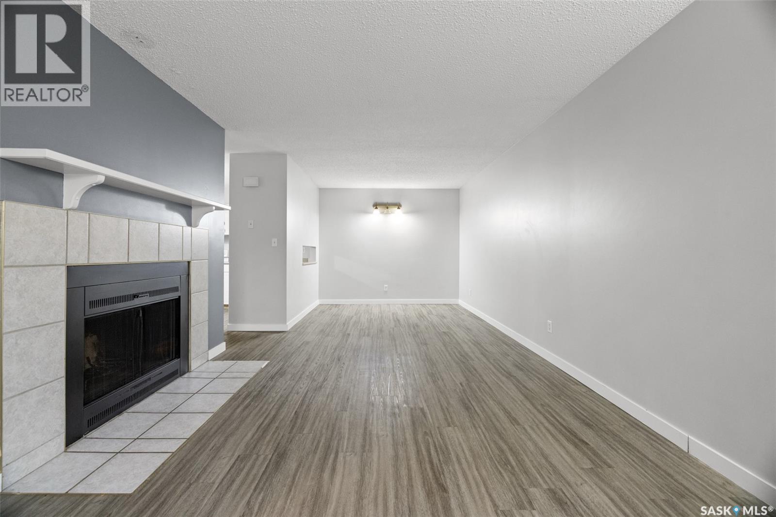 70 Gore Place, Regina, SK - Indoor With Fireplace