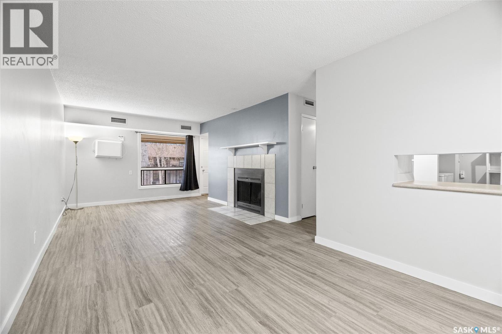 70 Gore Place, Regina, SK - Indoor With Fireplace