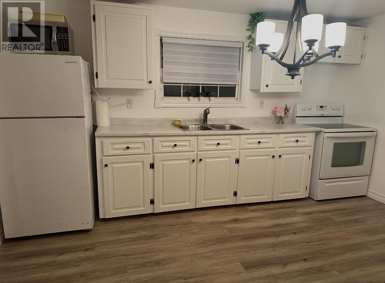 52 Fifth Street, Wabana, NL - Indoor Photo Showing Kitchen With Double Sink