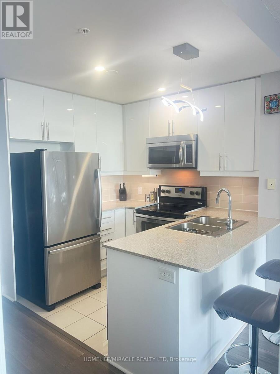 1406 - 3985 Grand Park Drive, Mississauga, ON - Indoor Photo Showing Kitchen With Stainless Steel Kitchen With Double Sink