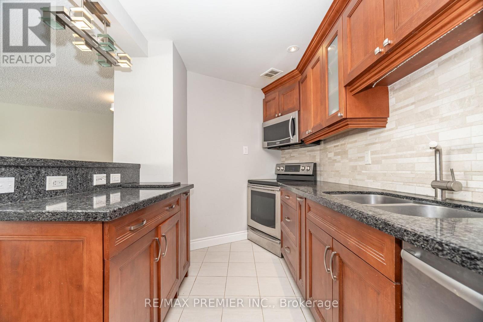 1602 - 475 The West Mall, Toronto, ON - Indoor Photo Showing Kitchen With Double Sink