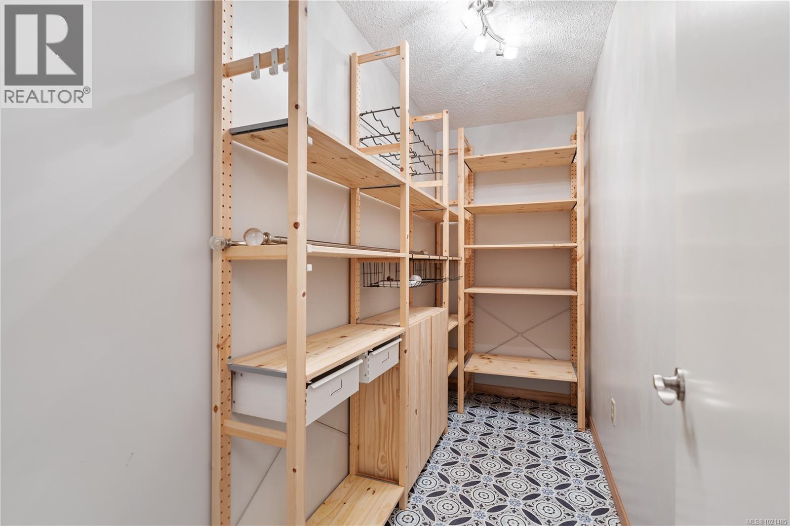 1985 Saunders Rd, Sooke, BC - Indoor With Storage