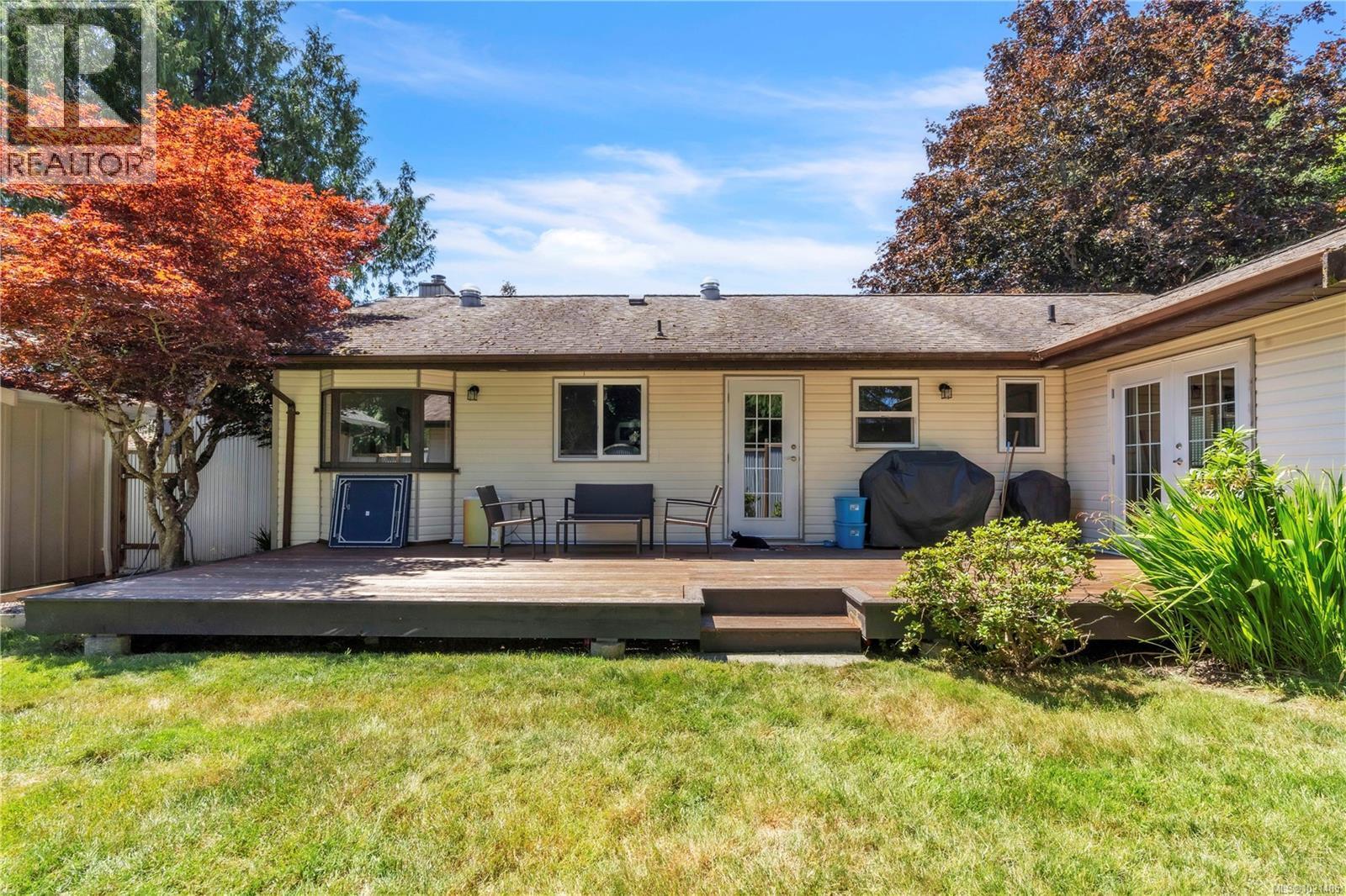 Back Yard Main House - 1985 Saunders Rd, Sooke, BC - Outdoor With Deck Patio Veranda