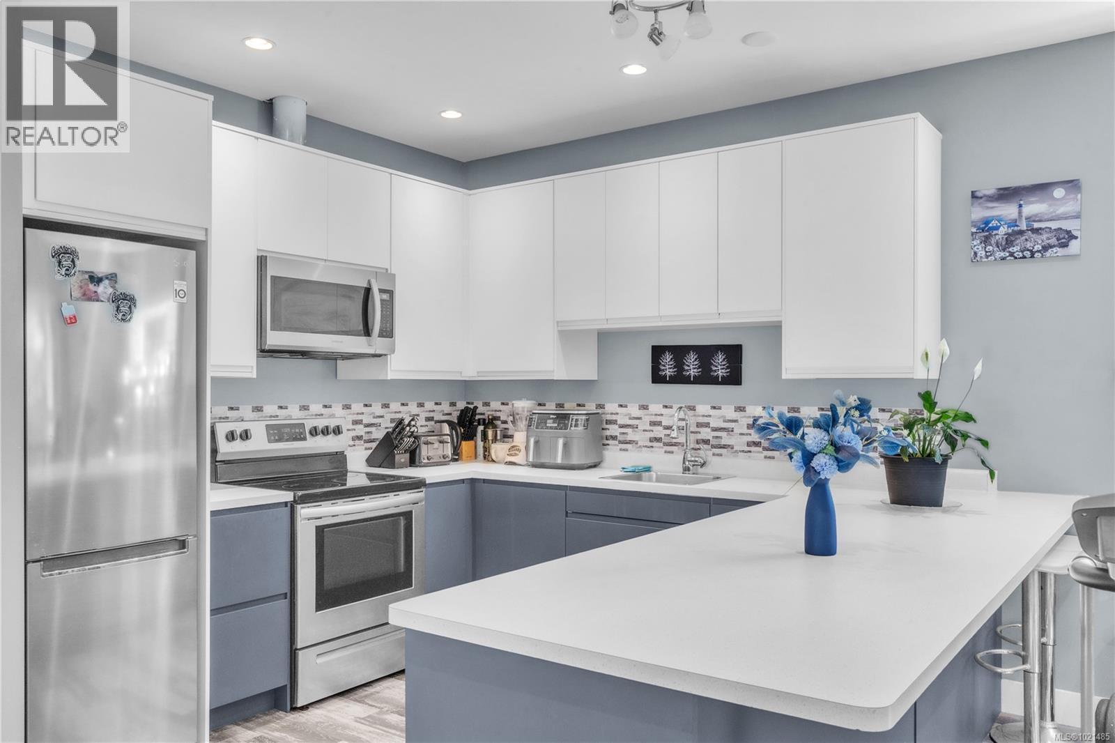Kitchen Guest House - 1985 Saunders Rd, Sooke, BC - Indoor Photo Showing Kitchen With Upgraded Kitchen