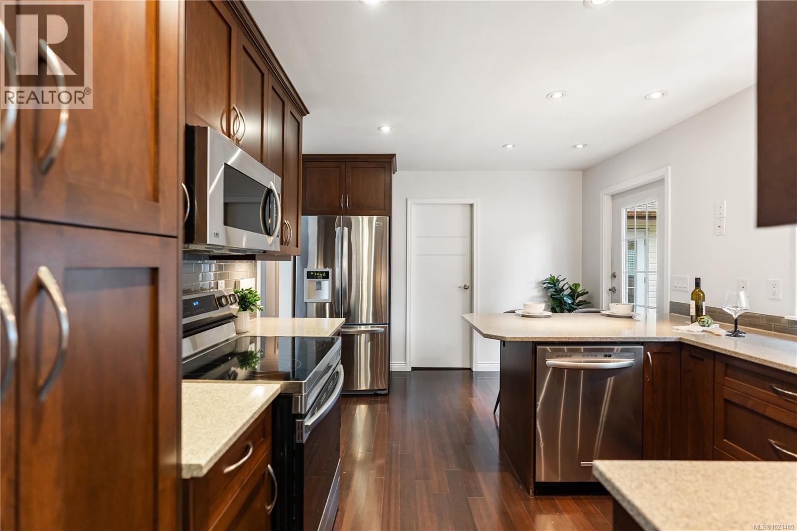 Main Home Kitchen - 1985 Saunders Rd, Sooke, BC - Indoor Photo Showing Kitchen With Double Sink With Upgraded Kitchen