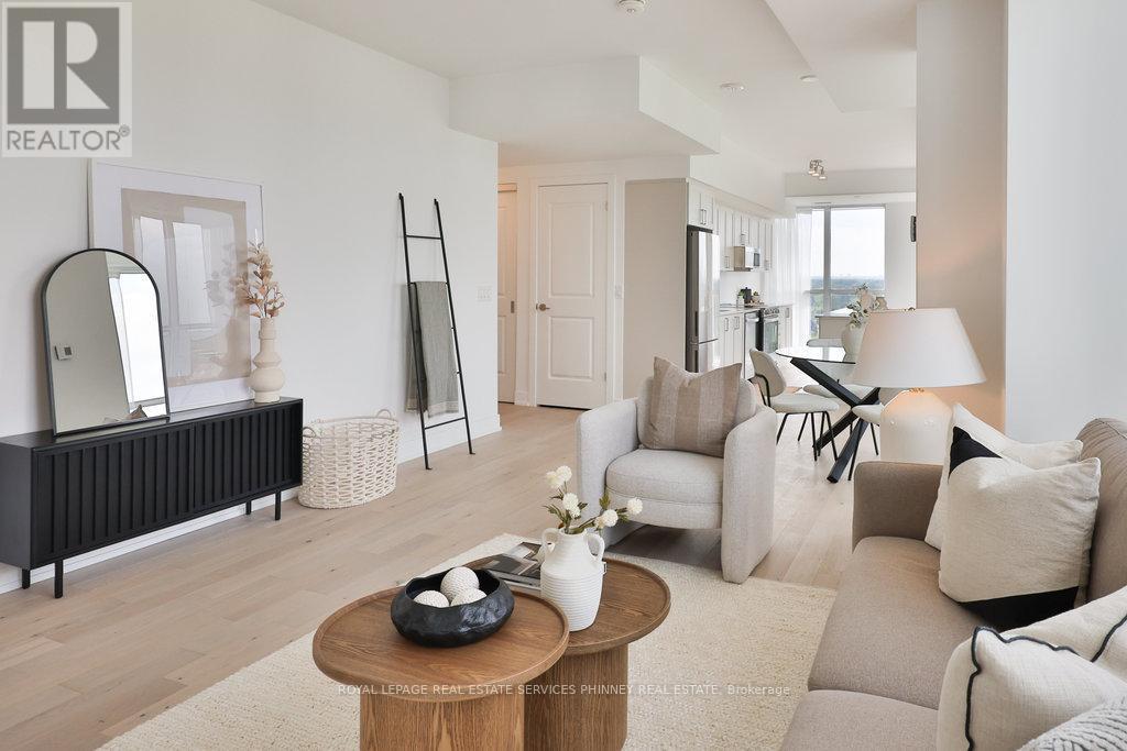 1207 - 1063 Douglas Mccurdy Common, Mississauga, ON - Indoor Photo Showing Living Room