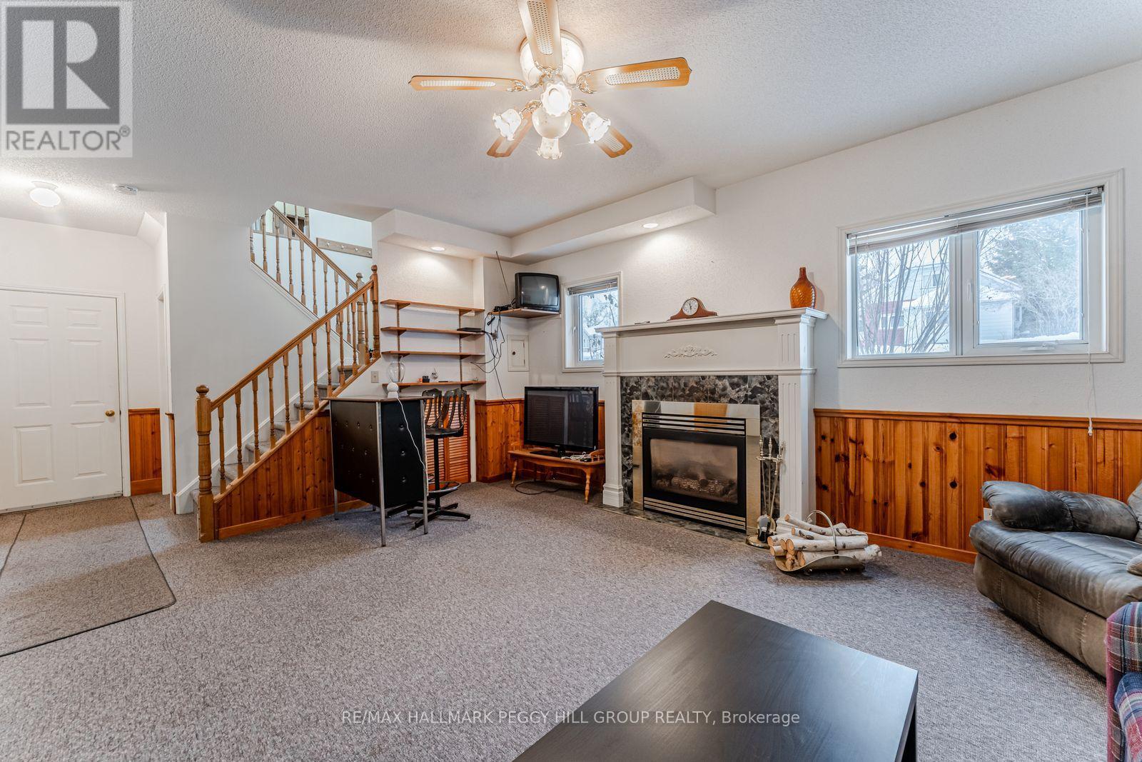 325 Ouida Street, Tay, ON - Indoor With Fireplace