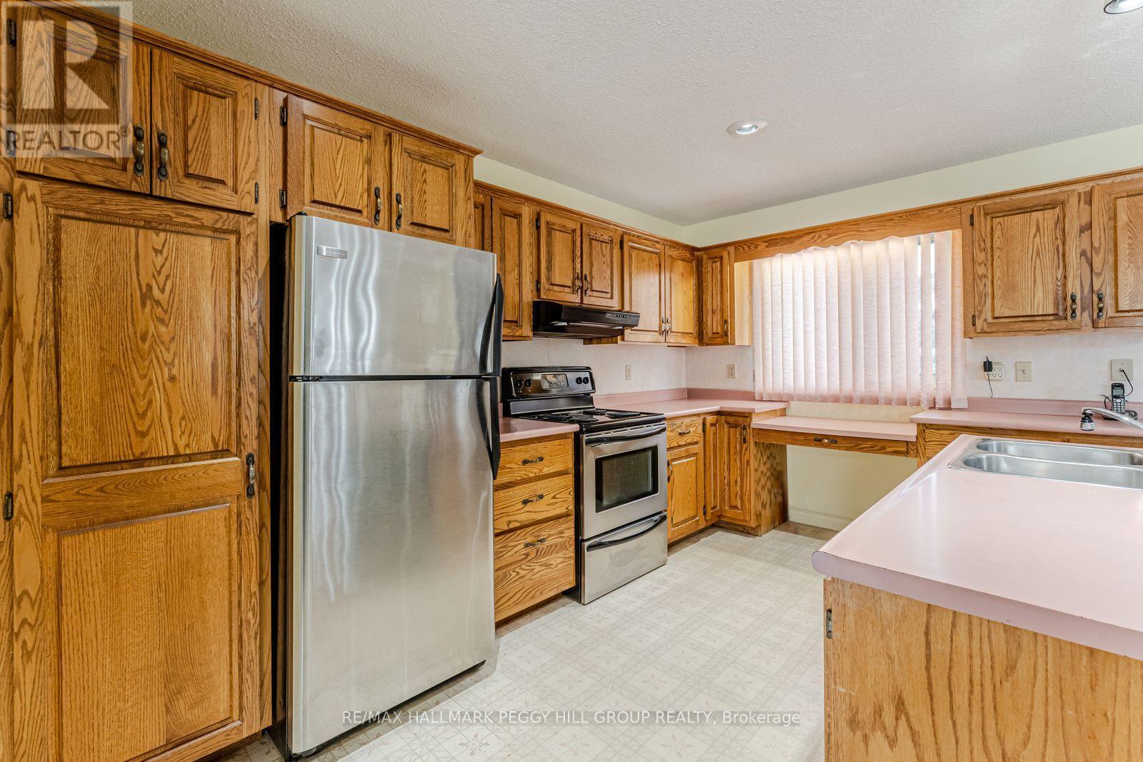 325 Ouida Street, Tay, ON - Indoor Photo Showing Kitchen With Double Sink