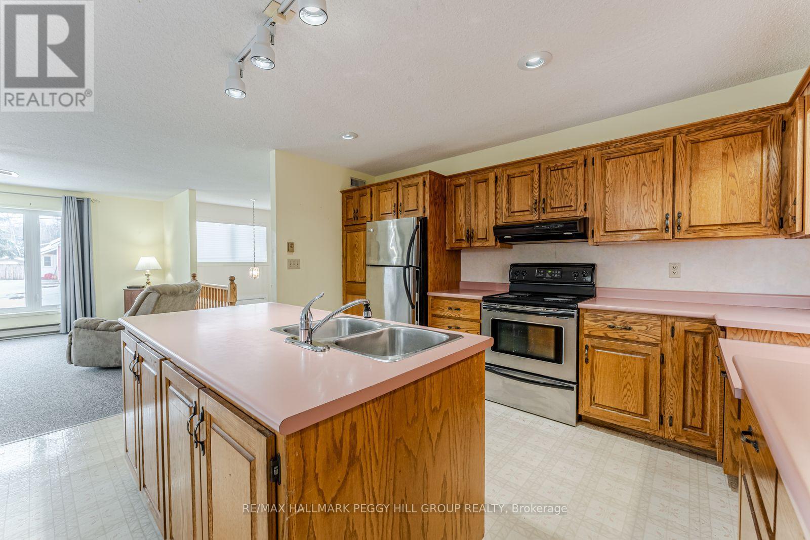 325 Ouida Street, Tay, ON - Indoor Photo Showing Kitchen With Double Sink