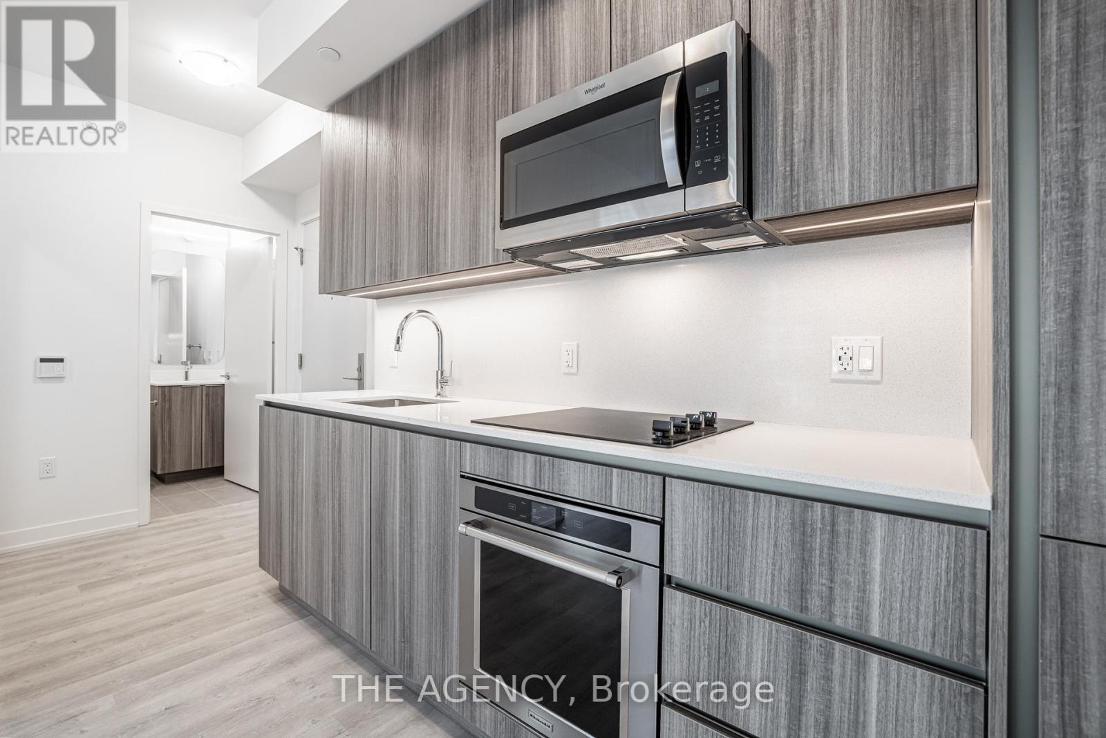 719 - 15 Richardson Street S, Toronto, ON - Indoor Photo Showing Kitchen With Upgraded Kitchen