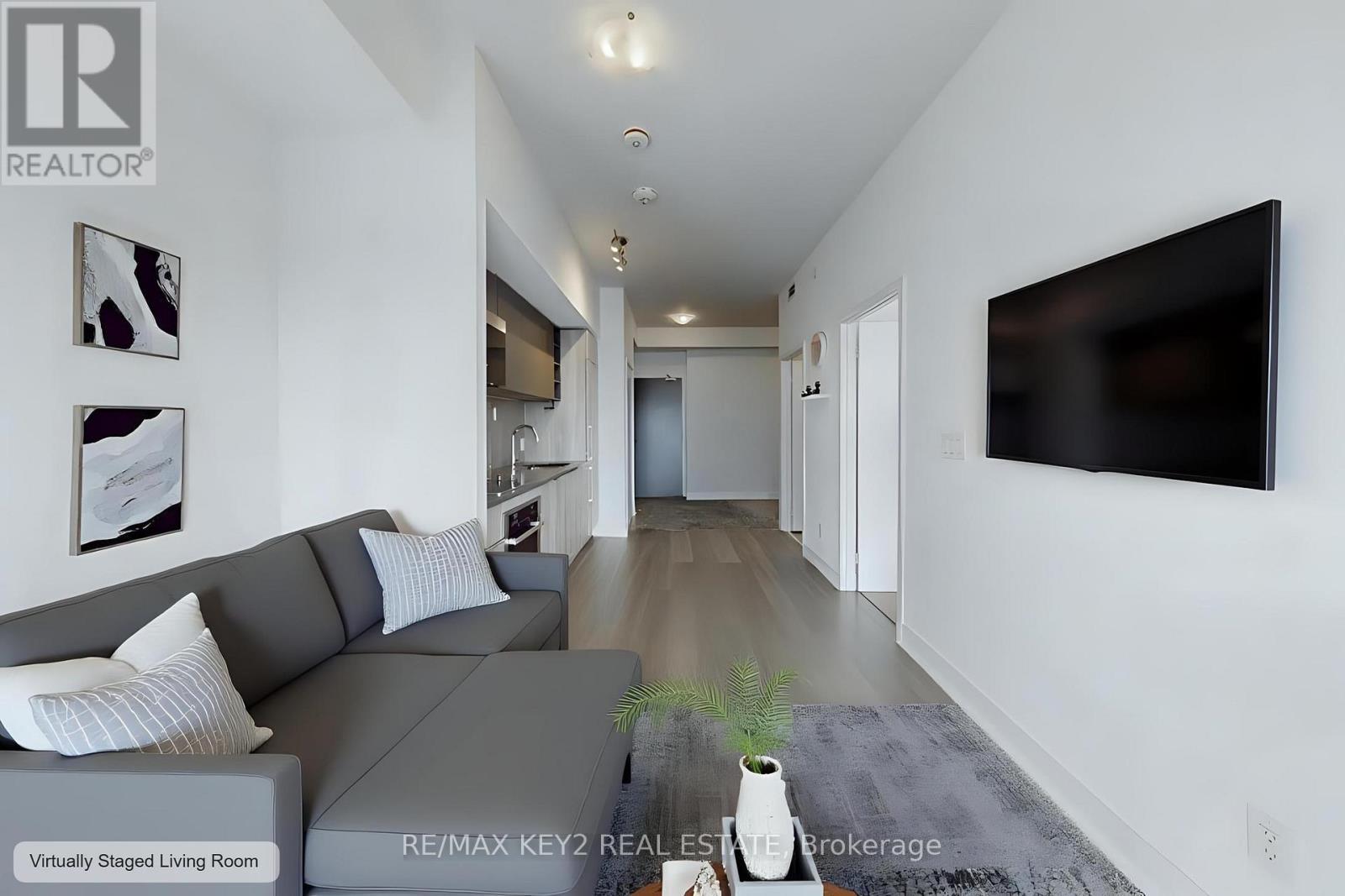1901 - 2033 Kennedy Road, Toronto, ON - Indoor Photo Showing Living Room
