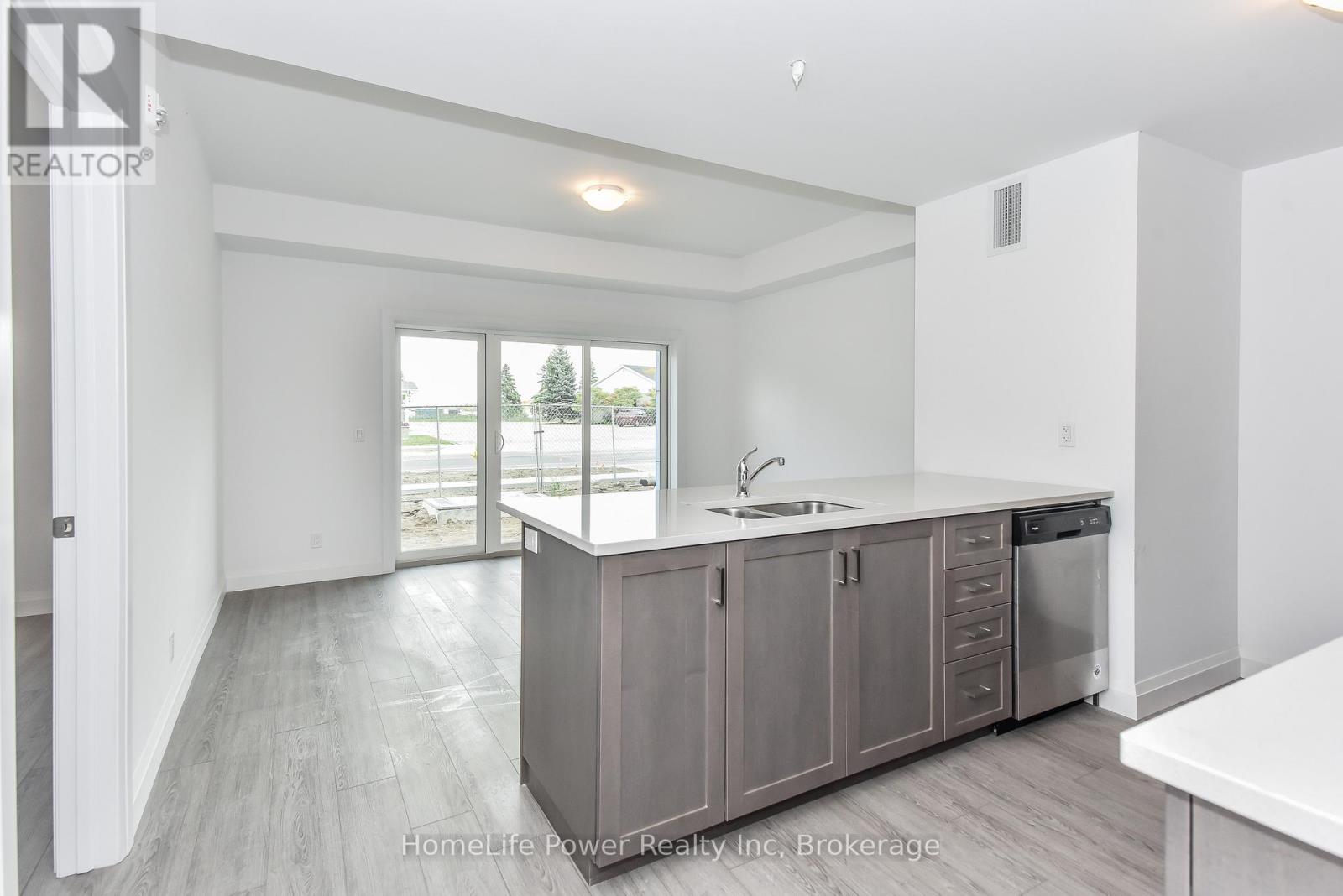 208 - 170 Northumberland Road W, North Dumfries, ON - Indoor Photo Showing Kitchen With Double Sink