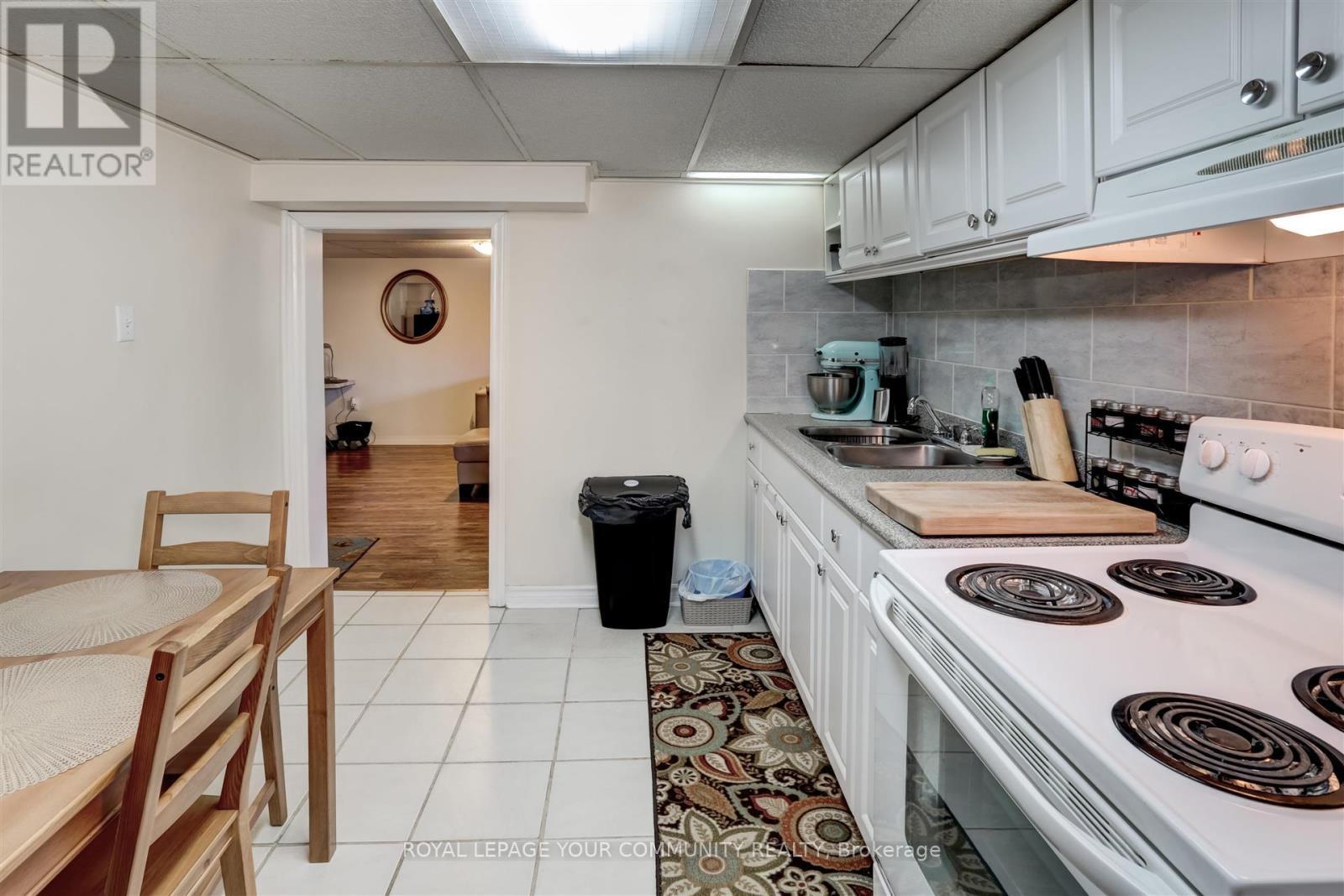 Basement - 18 Railway Street, Vaughan, ON - Indoor Photo Showing Kitchen With Double Sink