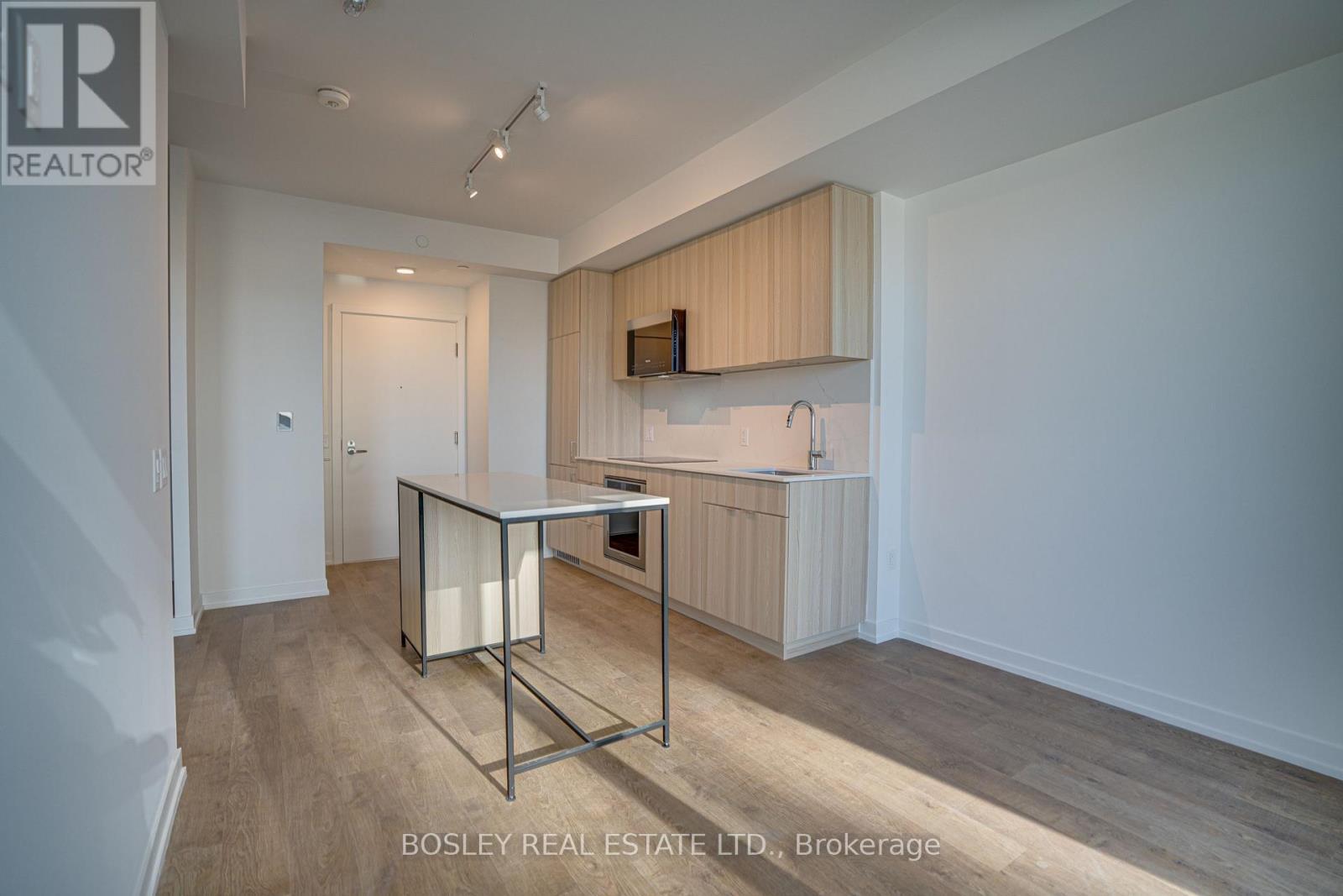 Open concept kitchen & living room - 414 - 251 Masonry Way, Mississauga, ON - Indoor