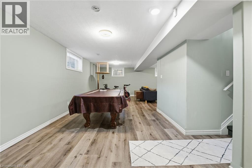 Rec room featuring billiards table and light wood-style floors - 14 Dunton Lane, Paris, ON - Indoor Photo Showing Other Room