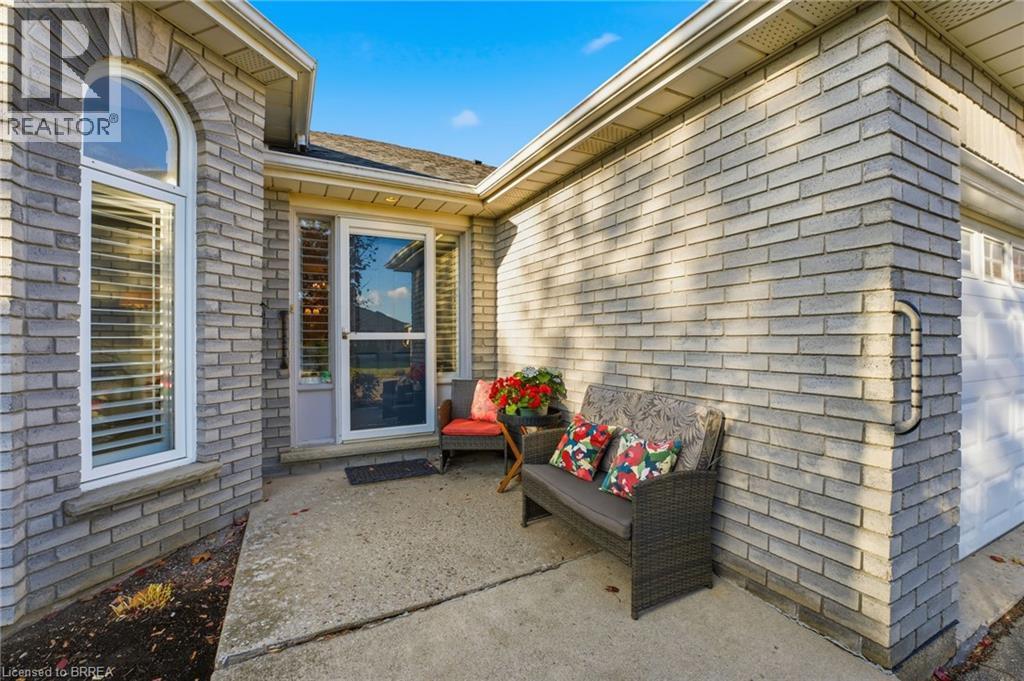 Entrance to property with a patio and brick siding - 14 Dunton Lane, Paris, ON - Outdoor With Deck Patio Veranda