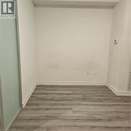 Empty room with wood-type flooring -