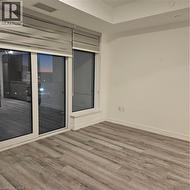 Unfurnished room with wood-type flooring -