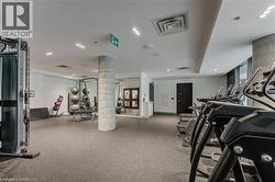 Workout area featuring decorative columns -