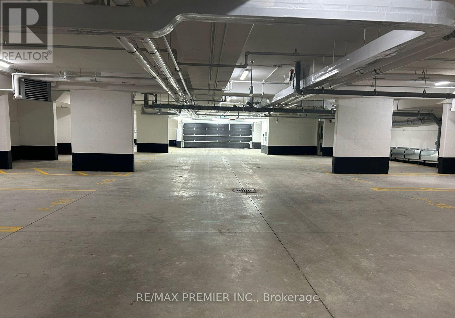 606 - 107 Roger Street, Waterloo, ON - Indoor Photo Showing Garage