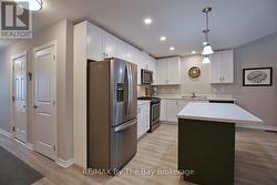 Open Concept Kitchen with Island for Extra Seating -