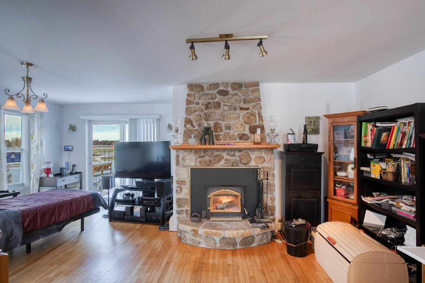 Living room - 467 Route 133, Pike River, QC - Indoor Photo Showing Living Room With Fireplace