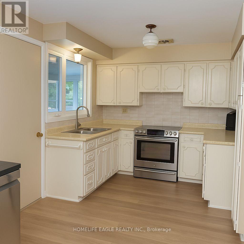 Upper - 33 Sumner Heights, Toronto, ON - Indoor Photo Showing Kitchen With Double Sink