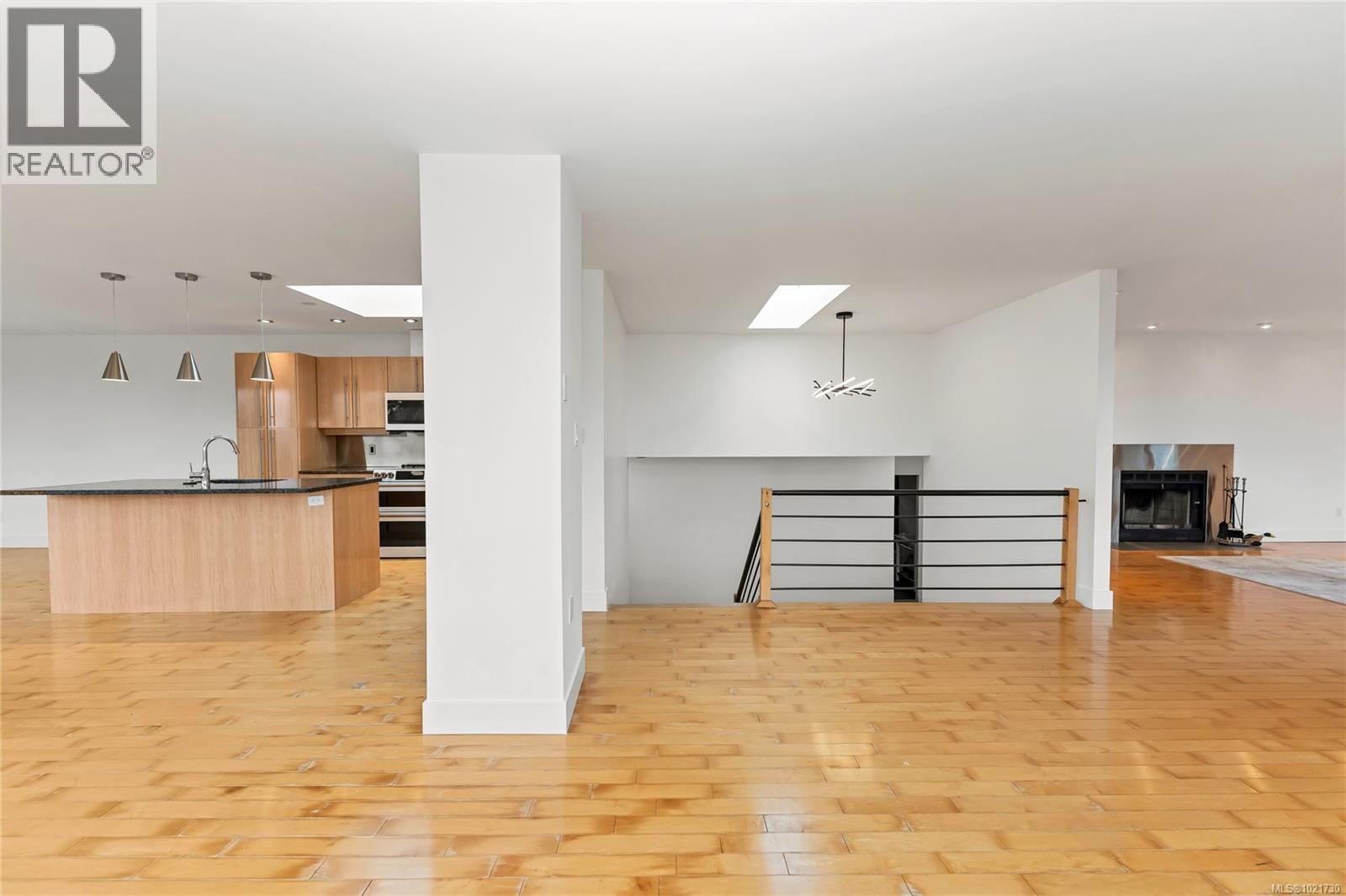 With stairs to lower level - 5198 Beckton Rd, Saanich, BC - Indoor Photo Showing Kitchen