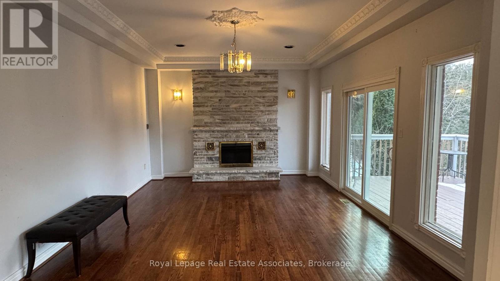 Upper - 2501 Mississauga Road, Mississauga, ON - Indoor Photo Showing Living Room With Fireplace