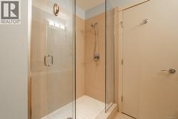 Ensuite bathroom tiled shower. -